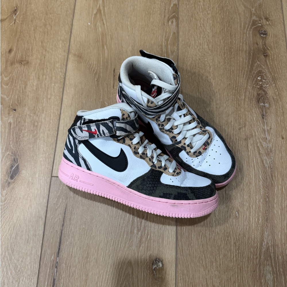 Nike High-Top Sneakers with Pink and Black Accents